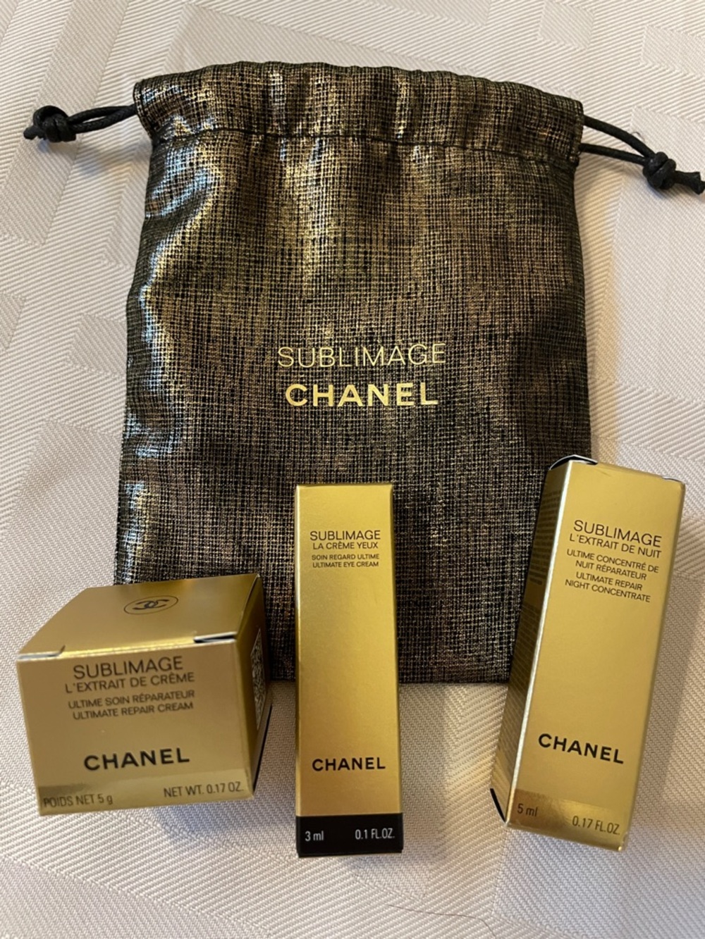 CHANEL Gold Sublimage Mini Skincare Trio with Metallic Pouch